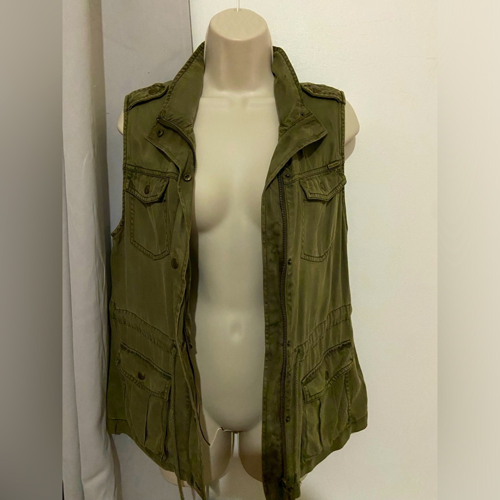 green vest.